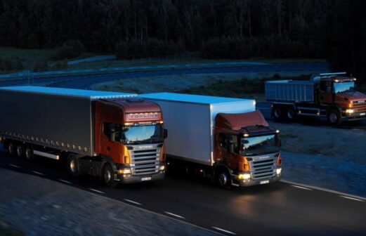 transgo-three-orange-Scania-trucks